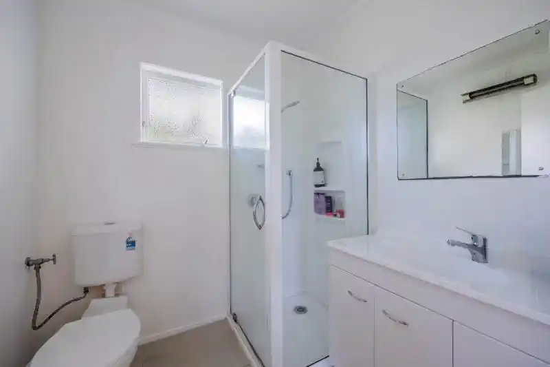 Double Westlake school zone, Brick, block and tile 2 x 2 beds 1 bath home with garage on 660m2 section, currently rented at $1,240 ($620 per dwelling), moments from Knightsbridge Reserve, Milford Beach, shopping centres, schools, motorway access, 1&2/5 Keldale Place, Forrest Hill, Auckland