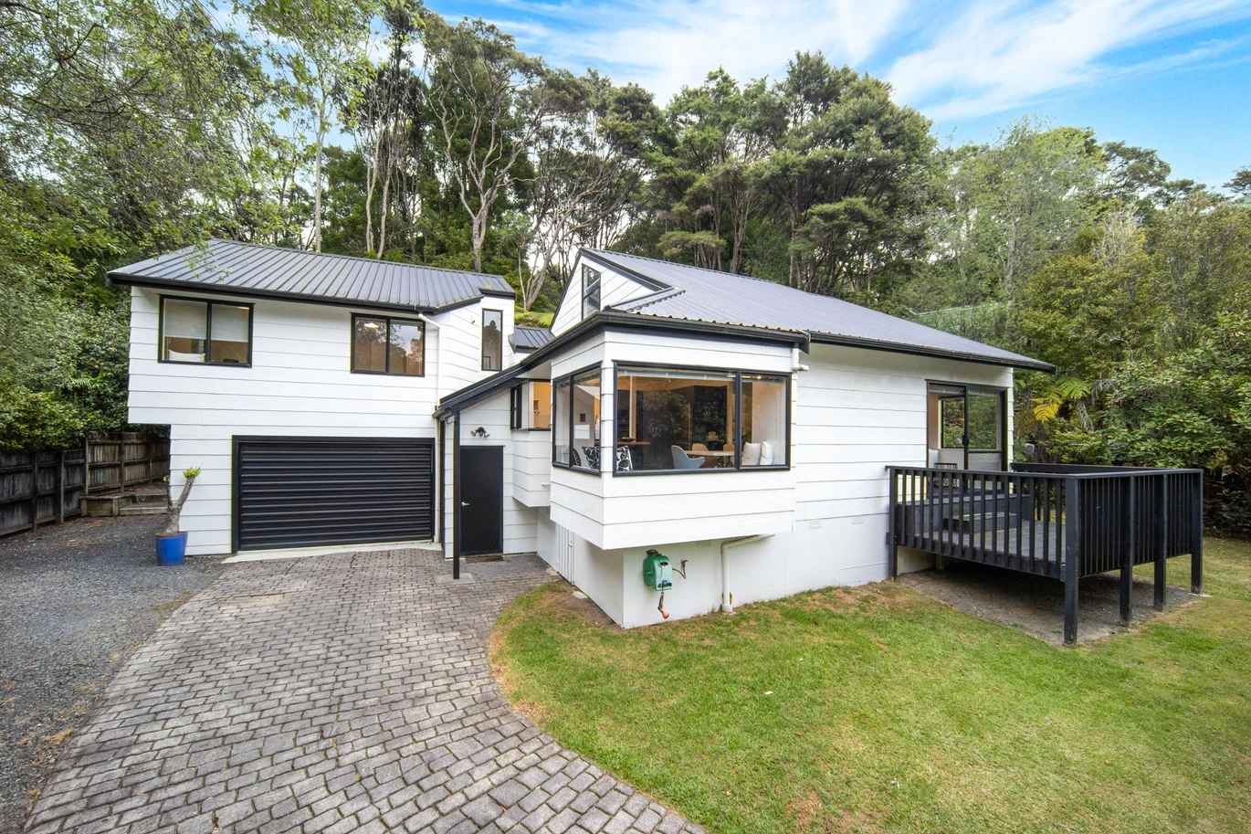 170m2 4 beds 1 bath house with garage on 669m2 section, move-in ready, with a tree-studded backyard in a sought-after leafy street, this beautifully maintained home offers great street appeal and the convenience of internal garaging. 53 Wirihana Road, Titirangi, Auckland