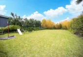 2 bed 1 bath house with garage on 809m2 section, The generous backyard provides plenty of room for kids to play, gardeners to potter, or future plans to unfold, 28 Norman Road, Titirangi, Auckland