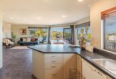 Once in 15 years, 5 beds 3 baths house on 546m2 section, Extra Large Double Garage + Workshop Area, 2x Walk-in Separate Storage Closets + Huge Under Stair Storage, Rooftop Solar Panels + Battery System Included, close to schools, shops, beach, zoned for Long Bay Primary School , Long Bay College, Northcross Intermediate School, 32 Ian Sage Avenue, Torbay, Auckland
