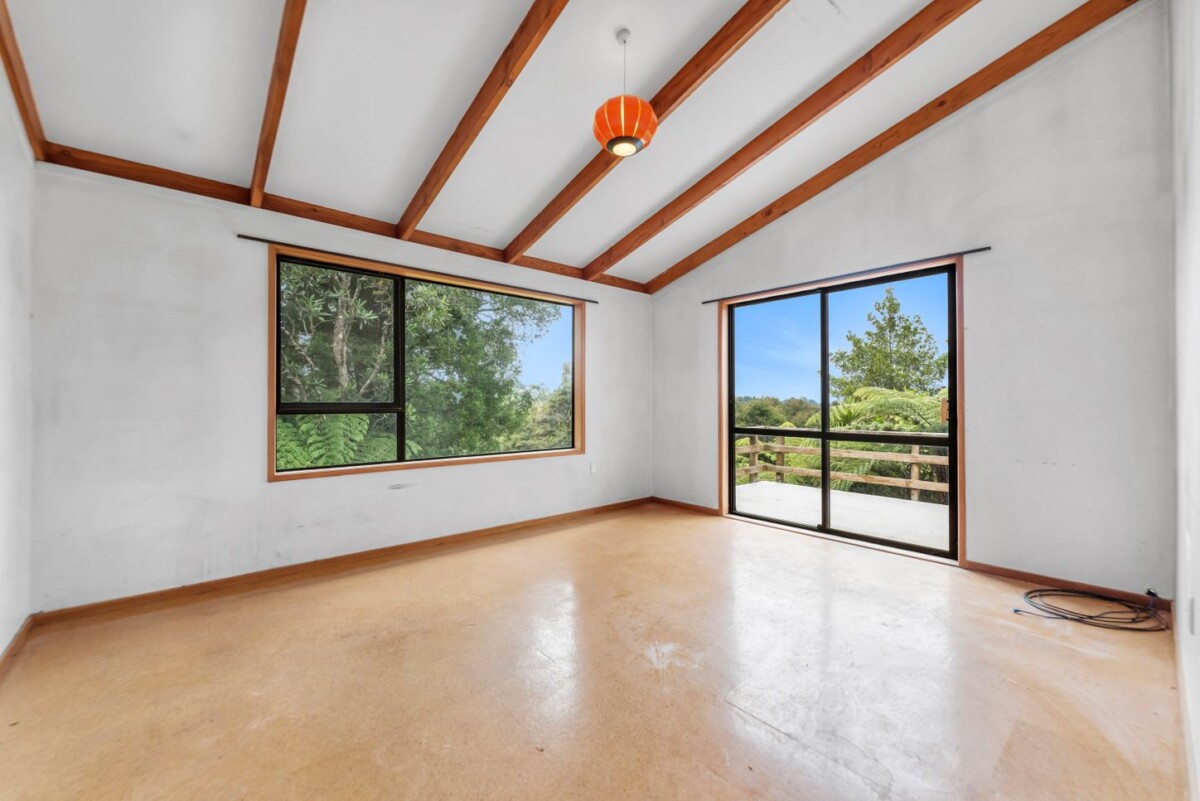 Once over 40 years, Owner Moved To Retirement Home, 221m2 4 beds 2 baths house with double garage on 1917m2 section, One of the decks enjoys glimpses of the sea, while the other sits just 30-40 metres from a magnificent, iconic Kauri tree, 58 Tainui Road, Titirangi, Auckland