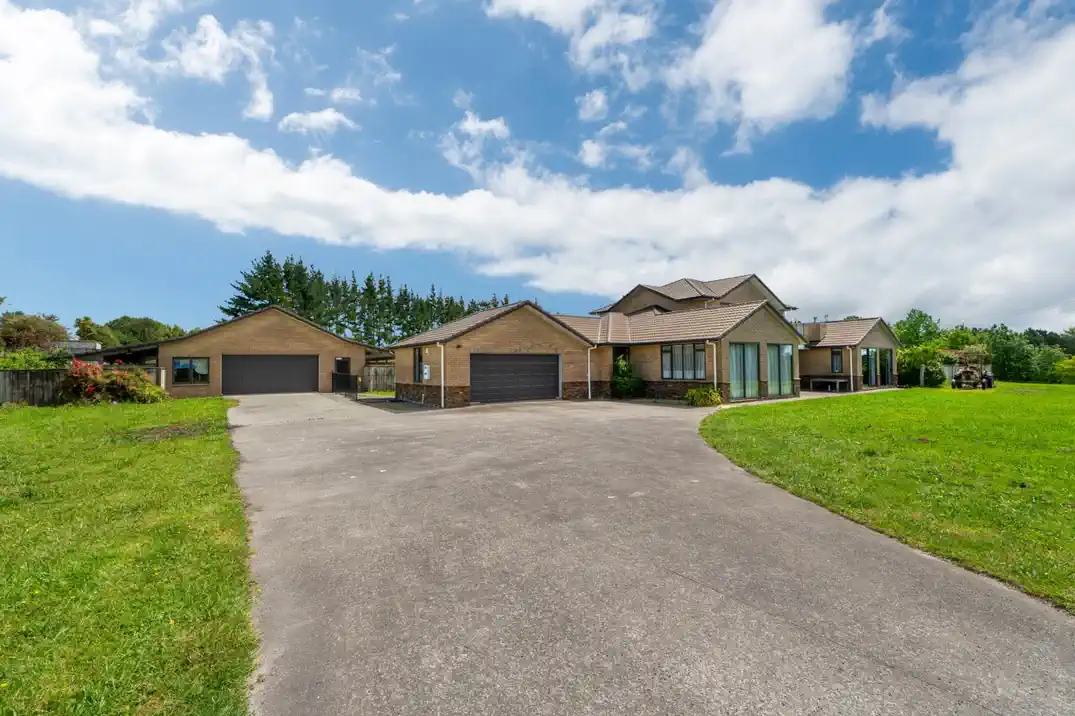 Once over 60 years, Brick and tile 4 beds 5 baths house on 8 acres (3.12ha) land, a large workshop with office and additional bedroom facilities, 1.1 km to Hobsonville School, 7 Sinton Road, Hobsonville, Auckland