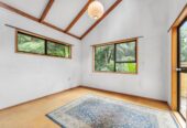 Once over 40 years, Owner Moved To Retirement Home, 221m2 4 beds 2 baths house with double garage on 1917m2 section, One of the decks enjoys glimpses of the sea, while the other sits just 30-40 metres from a magnificent, iconic Kauri tree, 58 Tainui Road, Titirangi, Auckland
