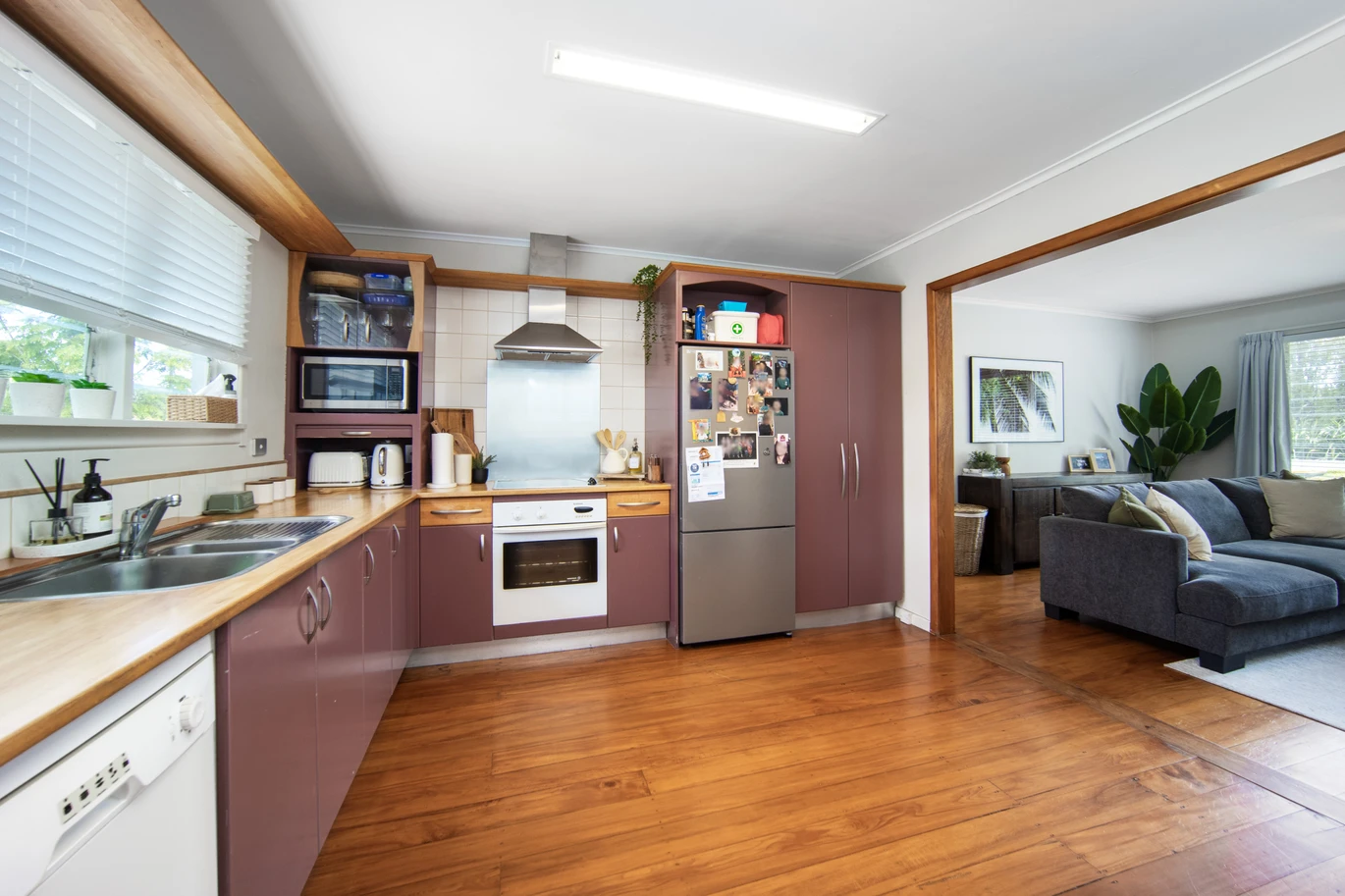 2 bed 1 bath house with garage on 809m2 section, The generous backyard provides plenty of room for kids to play, gardeners to potter, or future plans to unfold, 28 Norman Road, Titirangi, Auckland