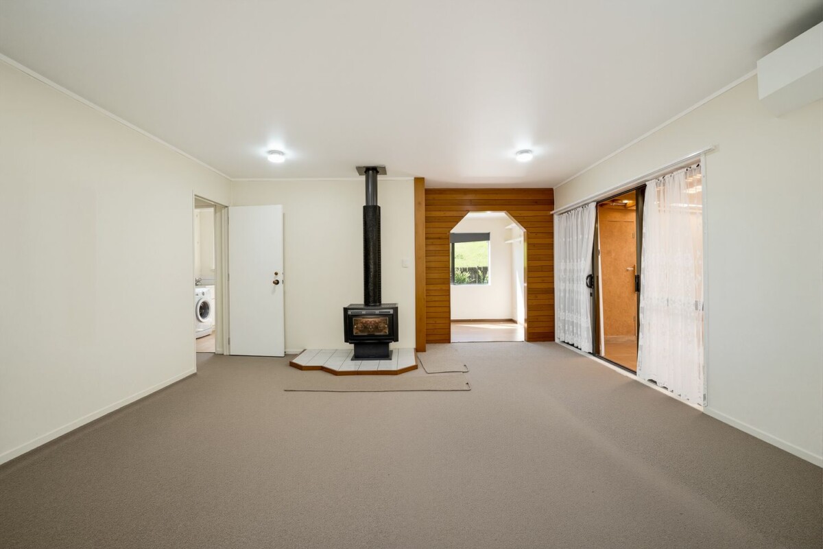 Backing directly onto Tui Glen Reserve, 3 beds 1 bath house with carport, just minutes from WestCity shopping centre, local cafes, schools, easy motorway access, 76B Chilcott Road, Henderson, Auckland