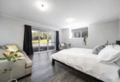 3 beds house on 766m2 section, Downstairs offers excellent additional space with a shower and two multi-purpose rooms, the Maungakiekie Golf Club is located on the same street, with shops, schools, and public transport all nearby, 13 Anita Avenue, Mount Roskill, Auckland