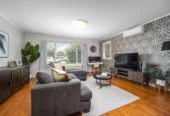 2 bed 1 bath house with garage on 809m2 section, The generous backyard provides plenty of room for kids to play, gardeners to potter, or future plans to unfold, 28 Norman Road, Titirangi, Auckland