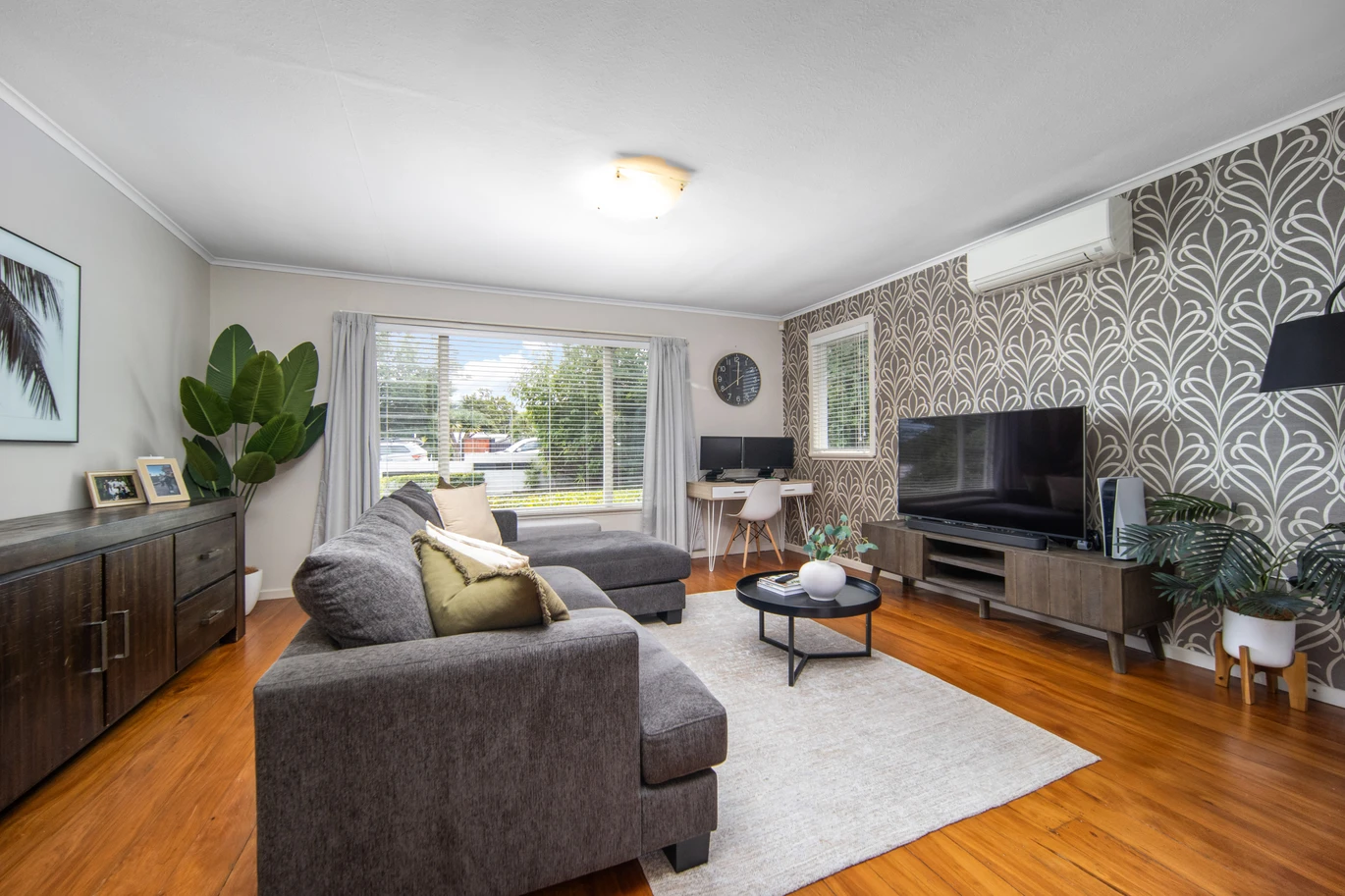 2 bed 1 bath house with garage on 809m2 section, The generous backyard provides plenty of room for kids to play, gardeners to potter, or future plans to unfold, 28 Norman Road, Titirangi, Auckland
