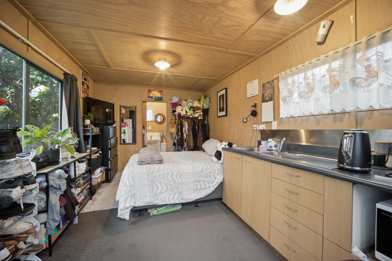 THAB zone, 3 beds 1 bath house with sleepout on 905m2 section, double garage plus a converted rumpus/playroom, Moments from the Te Atatu Peninsula town centre, Kervil Park and coastal walkways, zoned for Matipo Primary School, 13 Gladfield Lane, Te Atatu Peninsula, Auckland