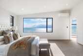 Macleans College zone, 299m2 Standalone 4 beds + study 3 baths home with double garage on 395m2 section, with panoramic sea views and direct beach access, close to schools, golf club, shops, zoned for Bucklands Beach Primary School, Bucklands Beach Intermediate, and Macleans College, 18A The Esplanade, Eastern Beach, Auckland