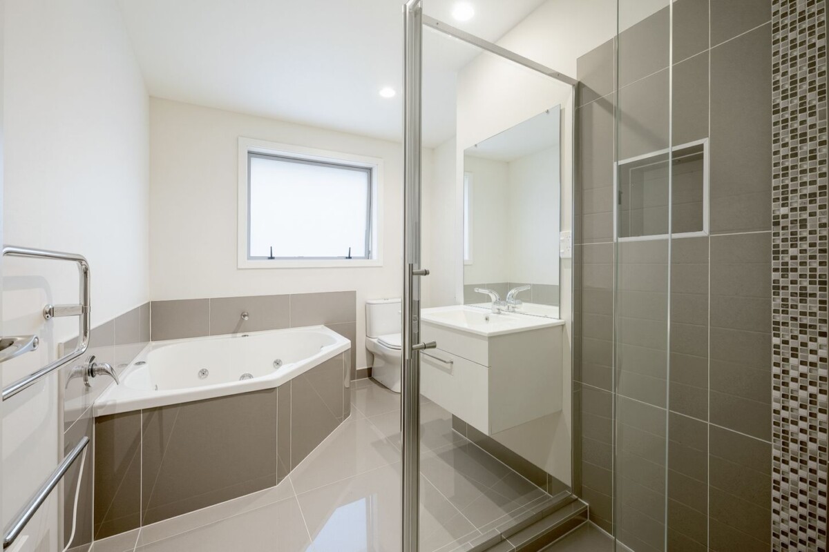 166m2 Brick and tile 3 beds + large office room 2 baths house with double garage on 475m2 section, close to amenities at Lincoln Road, Westgate and NorthWest shopping centres and motorway access, 79 Tiriwa Drive, Massey, Auckland