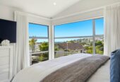 Rangitoto College zone, 5 beds 3 baths house with sea views, double garage on 562m2 section, close to schools, shops, beach, 0.2 km to Browns Bay School, 15a Korotaha Terrace, Rothesay Bay, Auckland