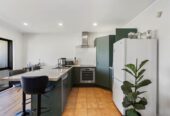 Rare Mixed-Use Opportunity, 98m2 upstairs 3 beds 1 bath apartment, 98m2 Flexible Commercial Space downstairs: 1 large office, 1 bath, Rear kitchenette area, Dedicated commercial entrance with courtyard patio, Additional large room with internal access to the double garage, Albany school zone, 15/18 Airborne Road, Rosedale, Auckland