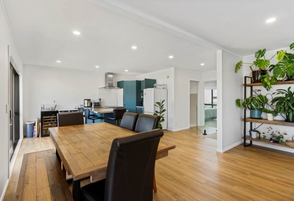 Rare Mixed-Use Opportunity, 98m2 upstairs 3 beds 1 bath apartment, 98m2 Flexible Commercial Space downstairs: 1 large office, 1 bath, Rear kitchenette area, Dedicated commercial entrance with courtyard patio, Additional large room with internal access to the double garage, Albany school zone, 15/18 Airborne Road, Rosedale, Auckland