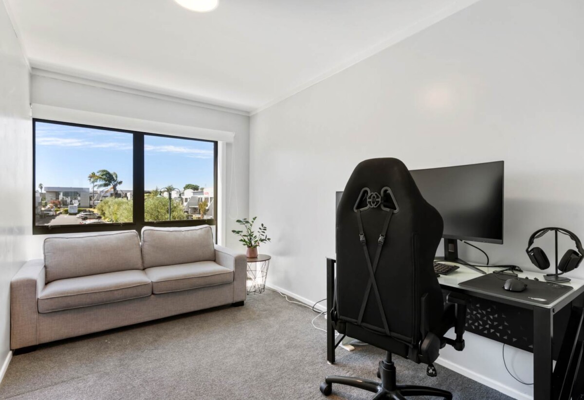 Rare Mixed-Use Opportunity, 98m2 upstairs 3 beds 1 bath apartment, 98m2 Flexible Commercial Space downstairs: 1 large office, 1 bath, Rear kitchenette area, Dedicated commercial entrance with courtyard patio, Additional large room with internal access to the double garage, Albany school zone, 15/18 Airborne Road, Rosedale, Auckland