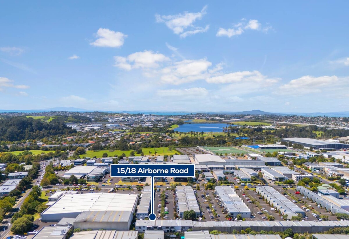 Rare Mixed-Use Opportunity, 98m2 upstairs 3 beds 1 bath apartment, 98m2 Flexible Commercial Space downstairs: 1 large office, 1 bath, Rear kitchenette area, Dedicated commercial entrance with courtyard patio, Additional large room with internal access to the double garage, Albany school zone, 15/18 Airborne Road, Rosedale, Auckland