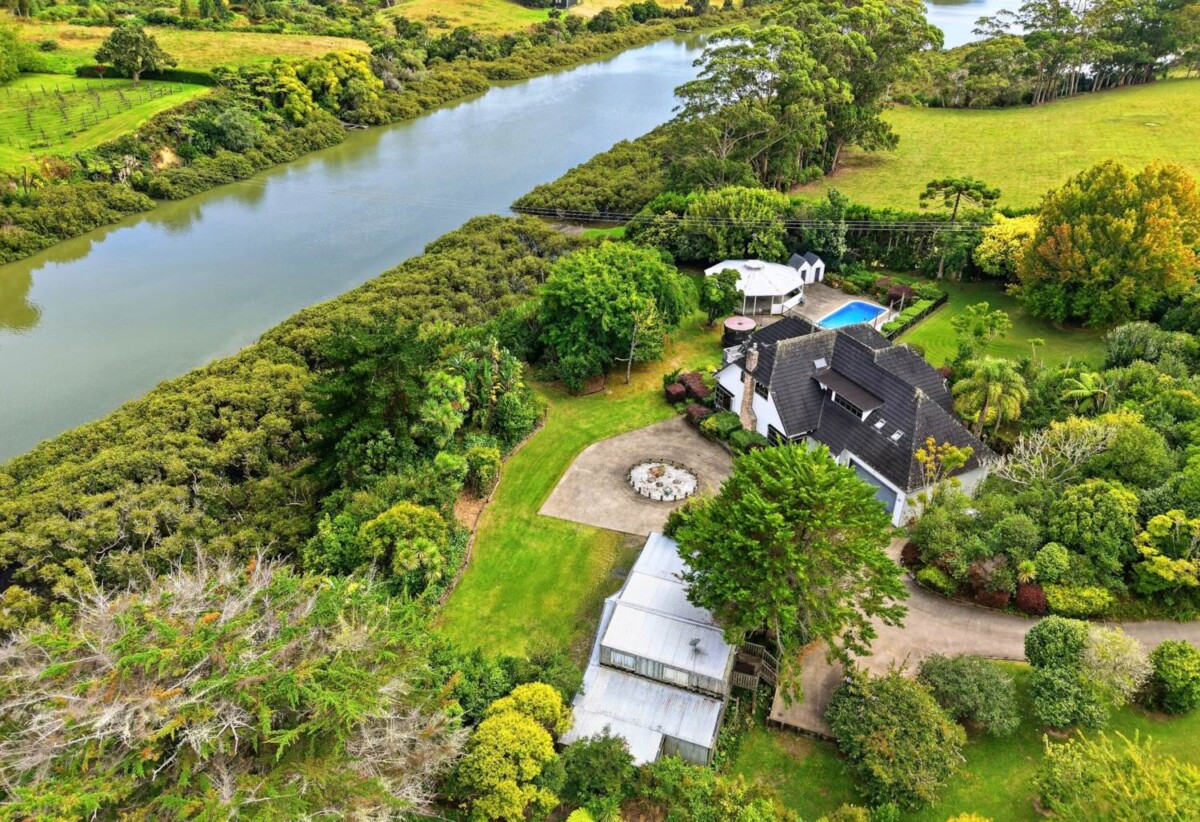 Home and income with private swimming pool on 2.5591ha waterfront land, 5 beds main home + 65sqm two-bedroom minor dwelling nestled in landscaped gardens, The Land: Five post-and-rail paddocks stand ready for horses or stock, 1.8 km to Whenuapai School, quick motorway access, a short drive to Westgate Mall, 10 Bristol Road, Whenuapai, Auckland