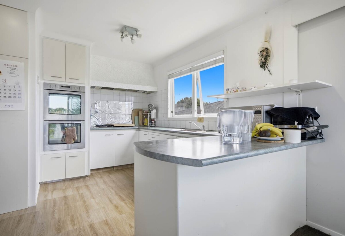 Double Westlake school zone, RC issued, 3 beds 2 baths house with double garage on 675m2 section, a huge lower-level rumpus room with independent external access, close to schools, shops, motorway access, 34 Knightsbridge Drive, Forrest Hill, Auckland