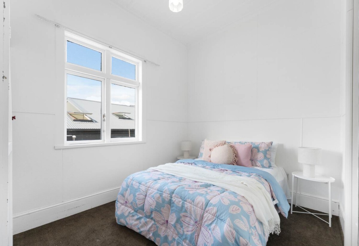 569sqm freehold corner section with two standalone houses on one title. 3-bedroom main residence (1/32) and a separate 2-bedroom dwelling (2/32), just a short stroll to Onehunga Mall, Dress Smart, Cornwall Park, Onehunga Bay Reserve and the train station, schools, 32 Hardington Street, Onehunga, Auckland