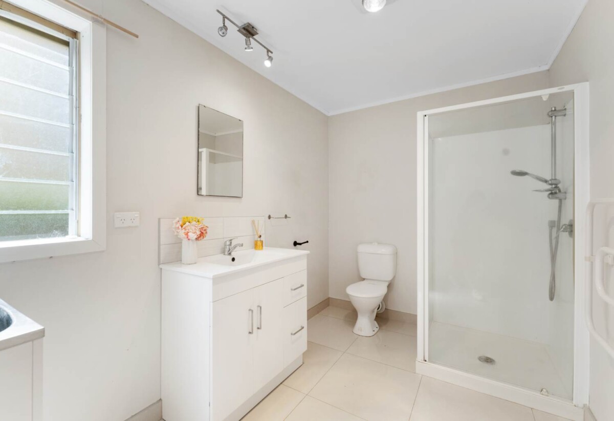 569sqm freehold corner section with two standalone houses on one title. 3-bedroom main residence (1/32) and a separate 2-bedroom dwelling (2/32), just a short stroll to Onehunga Mall, Dress Smart, Cornwall Park, Onehunga Bay Reserve and the train station, schools, 32 Hardington Street, Onehunga, Auckland