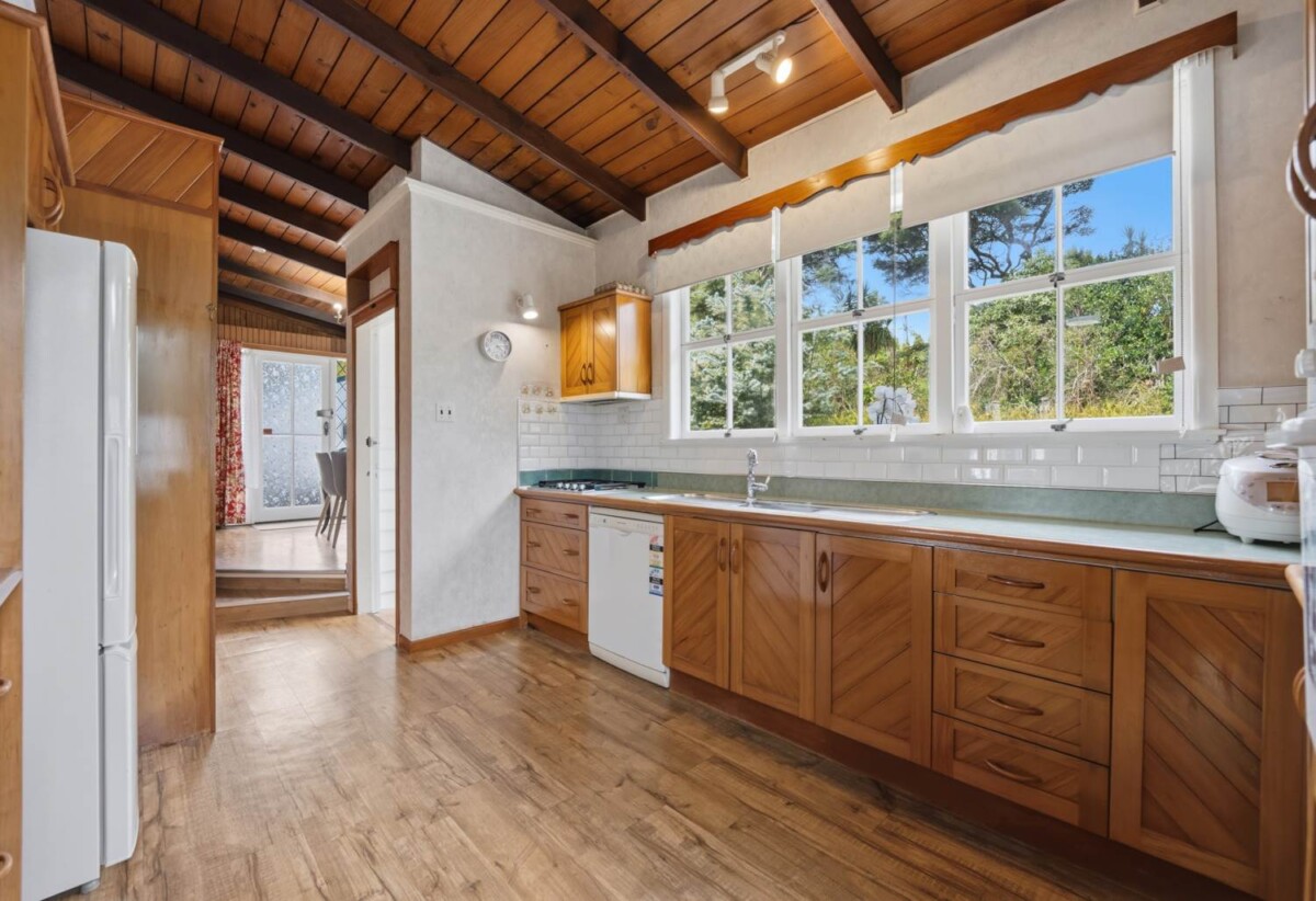 3,202 sqm of Local Centre Zone, 3 beds 2 baths house, A large covered deck overlooks your private park-like grounds, , A separate, generously sized studio with its own bathroom , zoned for Massey Primary School, Massey High School, 414 Don Buck Road, Massey, Auckland