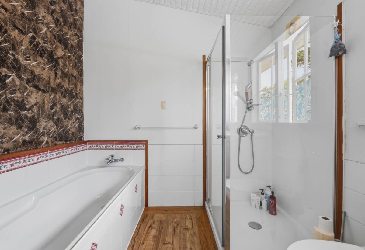 3,202 sqm of Local Centre Zone, 3 beds 2 baths house, A large covered deck overlooks your private park-like grounds, , A separate, generously sized studio with its own bathroom , zoned for Massey Primary School, Massey High School, 414 Don Buck Road, Massey, Auckland