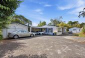3,202 sqm of Local Centre Zone, 3 beds 2 baths house, A large covered deck overlooks your private park-like grounds, , A separate, generously sized studio with its own bathroom , zoned for Massey Primary School, Massey High School, 414 Don Buck Road, Massey, Auckland