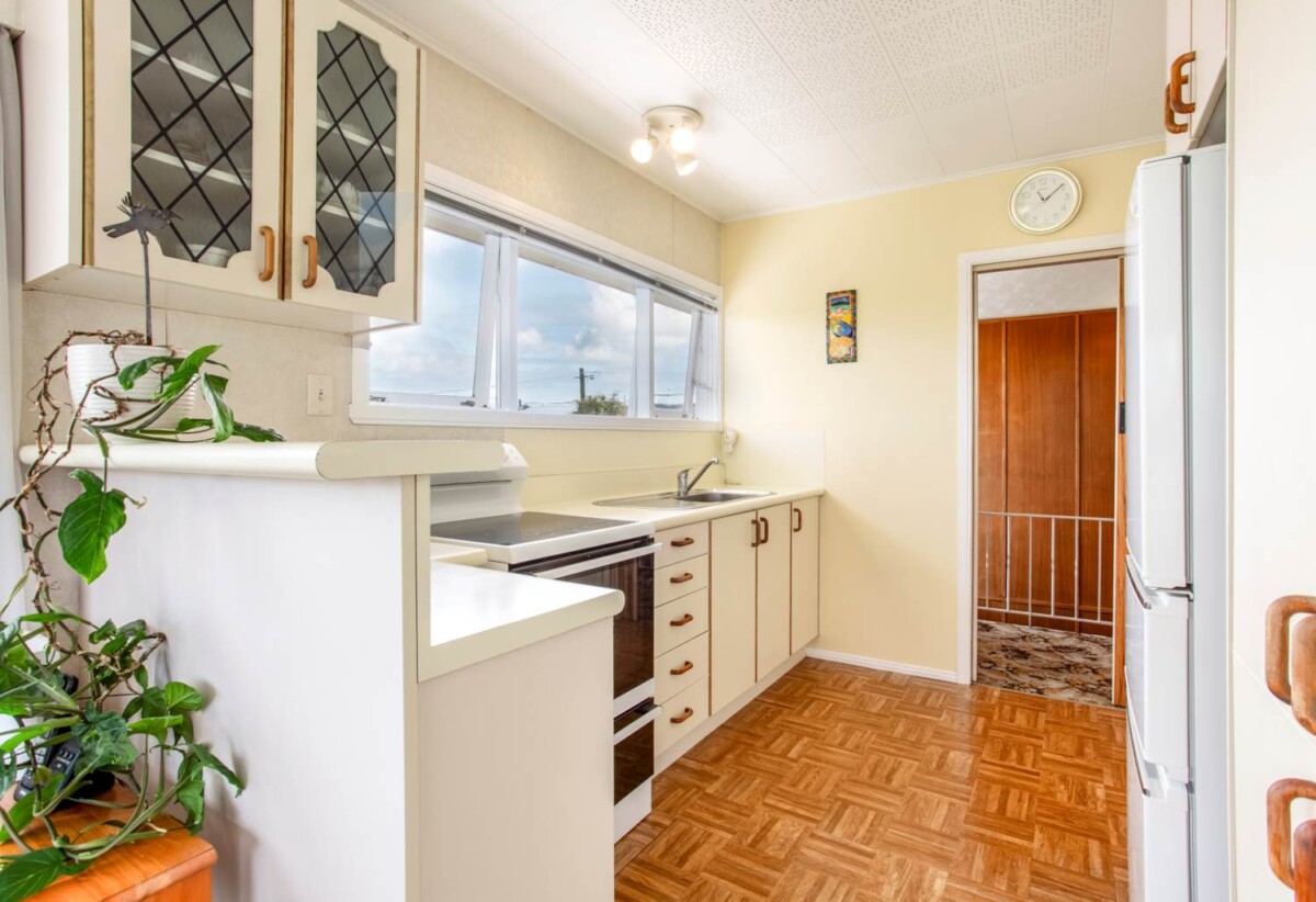 Once in 45 years, 150m2 Brick and tile 3 beds 1+ 1 office room 1 bath house with double garage on 625m2 section, a huge workshop downstairs, easy motorway access and a short drive to LynnMall and St Luke’s Mall. Zoned for New Windsor Primary School (just across the road), Blockhouse Bay Intermediate, and Avondale College, 45 Peter Buck Road, New Windsor, Auckland