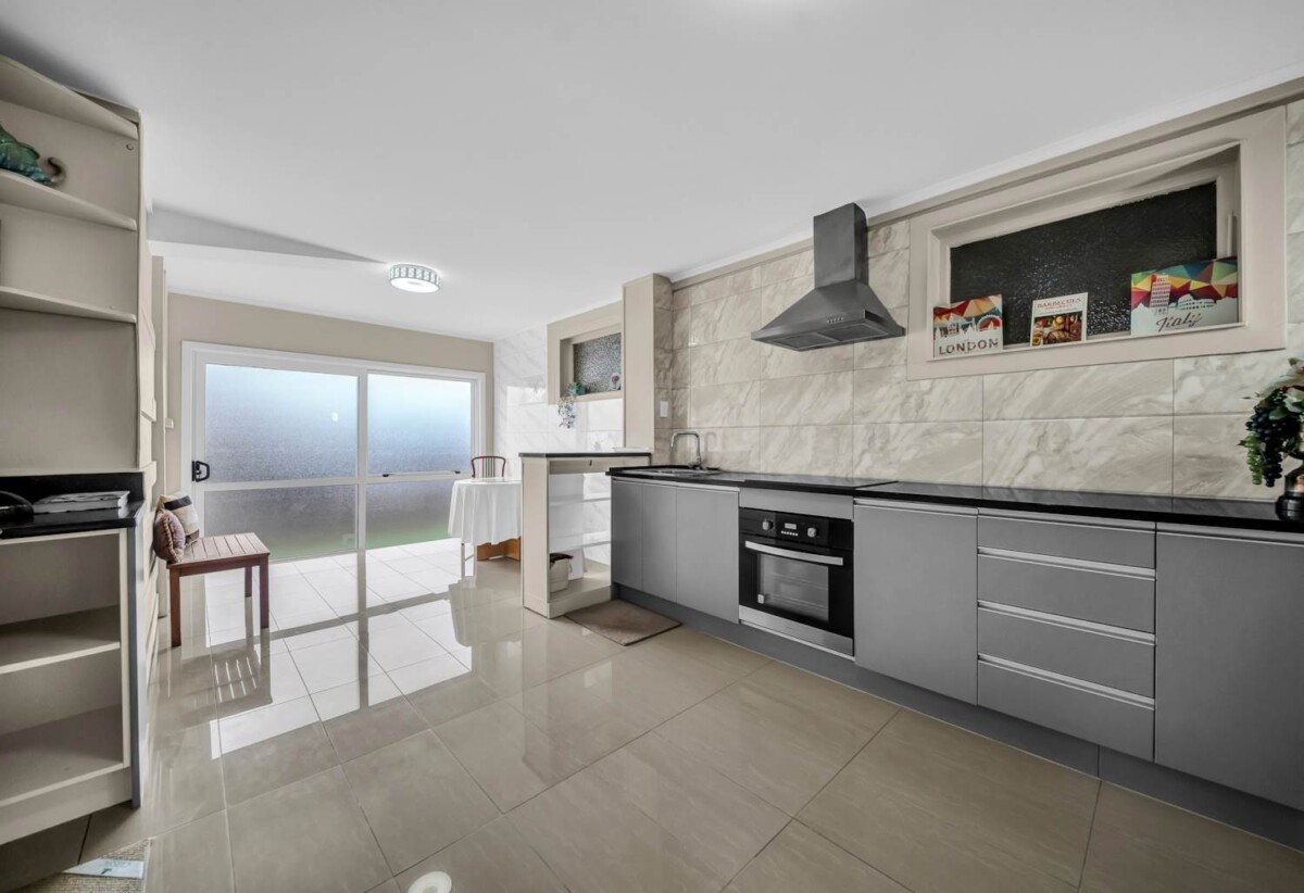 6 beds 3.5 baths house with carport, two levels, each level has 3 beds, bath, kitchen, dining and sitting area, close to Howick Village, schools, beach, 0.8 km to Howick Intermediate, 74 Ridge Road, Howick, Auckland