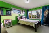 Brick and tile 4 beds 1 bath house with garage on 825m2 section, A child centre near by and a short drive to the local schools and shopping malls, handy to motorway access, 0.7 km to Papatoetoe East School, 32 Esperanto Road, Papatoetoe, Auckland