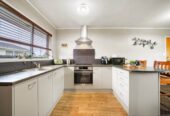 Brick and tile 2 beds 1 bath home with 2 single garages, Minutes to Takanini Village, supermarkets & popular eateries, Close to Bruce Pulman Park, Easy motorway access, 0.8 km to Takanini School, 2/21 Berwyn Avenue, Takanini, Auckland