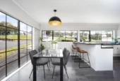 3 beds house on 766m2 section, Downstairs offers excellent additional space with a shower and two multi-purpose rooms, the Maungakiekie Golf Club is located on the same street, with shops, schools, and public transport all nearby, 13 Anita Avenue, Mount Roskill, Auckland