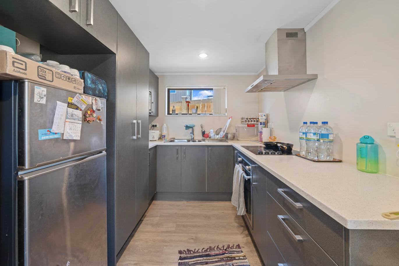 Home and income on 801m2 section, two separate three-bedroom dwellings on one title, each with its own driveway, currently rented for $1,030 per week, close to schools, golf club, shops, 18 Volante Avenue, Wattle Downs, Auckland