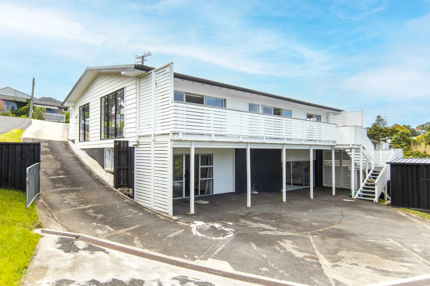 3 beds house on 766m2 section, Downstairs offers excellent additional space with a shower and two multi-purpose rooms, the Maungakiekie Golf Club is located on the same street, with shops, schools, and public transport all nearby, 13 Anita Avenue, Mount Roskill, Auckland
