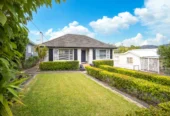 2 bed 1 bath house with garage on 809m2 section, The generous backyard provides plenty of room for kids to play, gardeners to potter, or future plans to unfold, 28 Norman Road, Titirangi, Auckland