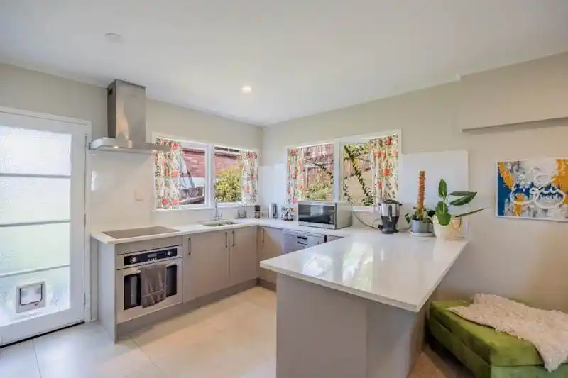 Double Westlake school zone, Brick, block and tile 2 x 2 beds 1 bath home with garage on 660m2 section, currently rented at $1,240 ($620 per dwelling), moments from Knightsbridge Reserve, Milford Beach, shopping centres, schools, motorway access, 1&2/5 Keldale Place, Forrest Hill, Auckland