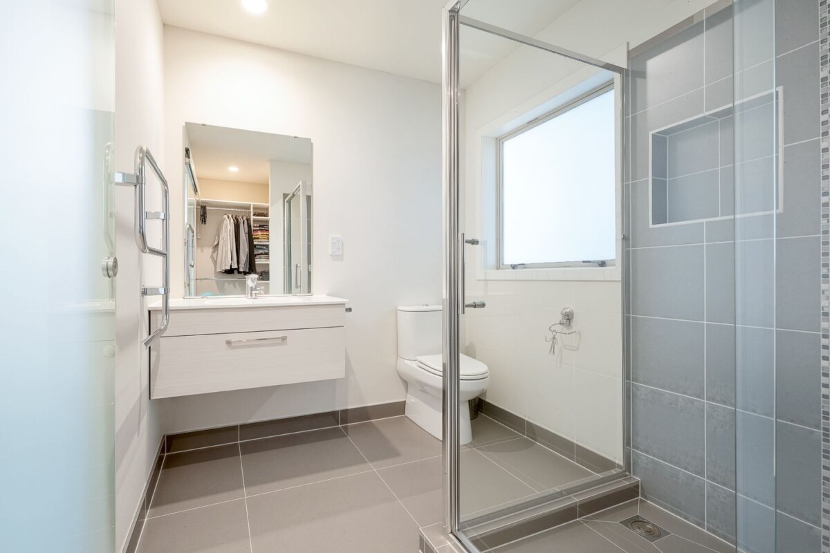 166m2 Brick and tile 3 beds + large office room 2 baths house with double garage on 475m2 section, close to amenities at Lincoln Road, Westgate and NorthWest shopping centres and motorway access, 79 Tiriwa Drive, Massey, Auckland