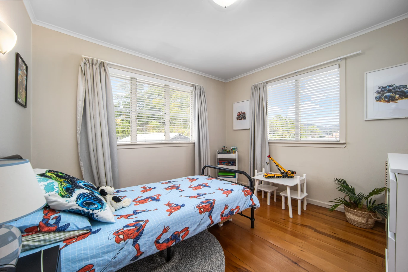 2 bed 1 bath house with garage on 809m2 section, The generous backyard provides plenty of room for kids to play, gardeners to potter, or future plans to unfold, 28 Norman Road, Titirangi, Auckland
