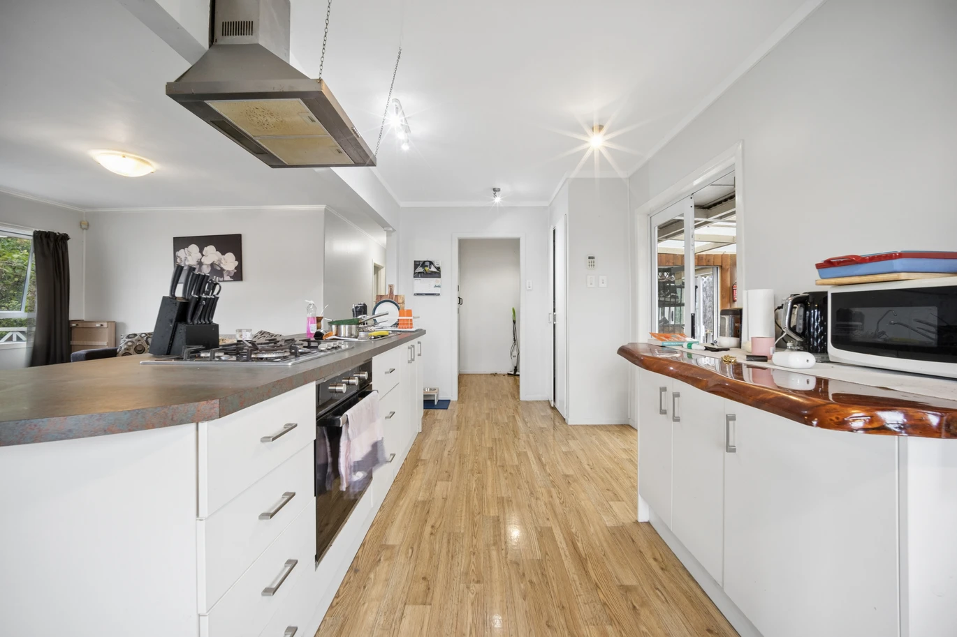 THAB zone, 3 beds 1 bath house with sleepout on 905m2 section, double garage plus a converted rumpus/playroom, Moments from the Te Atatu Peninsula town centre, Kervil Park and coastal walkways, zoned for Matipo Primary School, 13 Gladfield Lane, Te Atatu Peninsula, Auckland