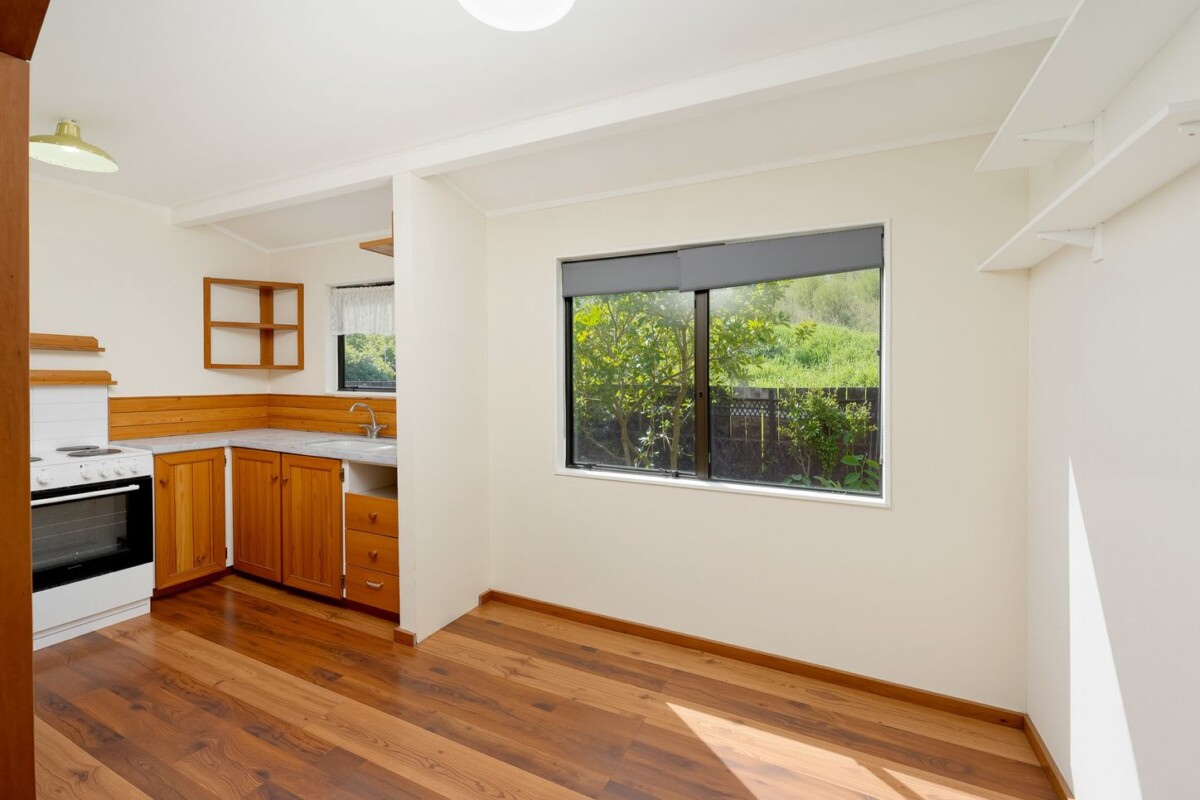 Backing directly onto Tui Glen Reserve, 3 beds 1 bath house with carport, just minutes from WestCity shopping centre, local cafes, schools, easy motorway access, 76B Chilcott Road, Henderson, Auckland