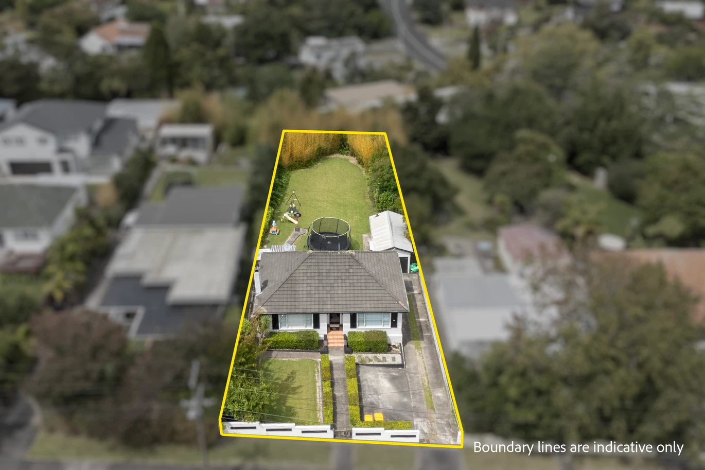 2 bed 1 bath house with garage on 809m2 section, The generous backyard provides plenty of room for kids to play, gardeners to potter, or future plans to unfold, 28 Norman Road, Titirangi, Auckland