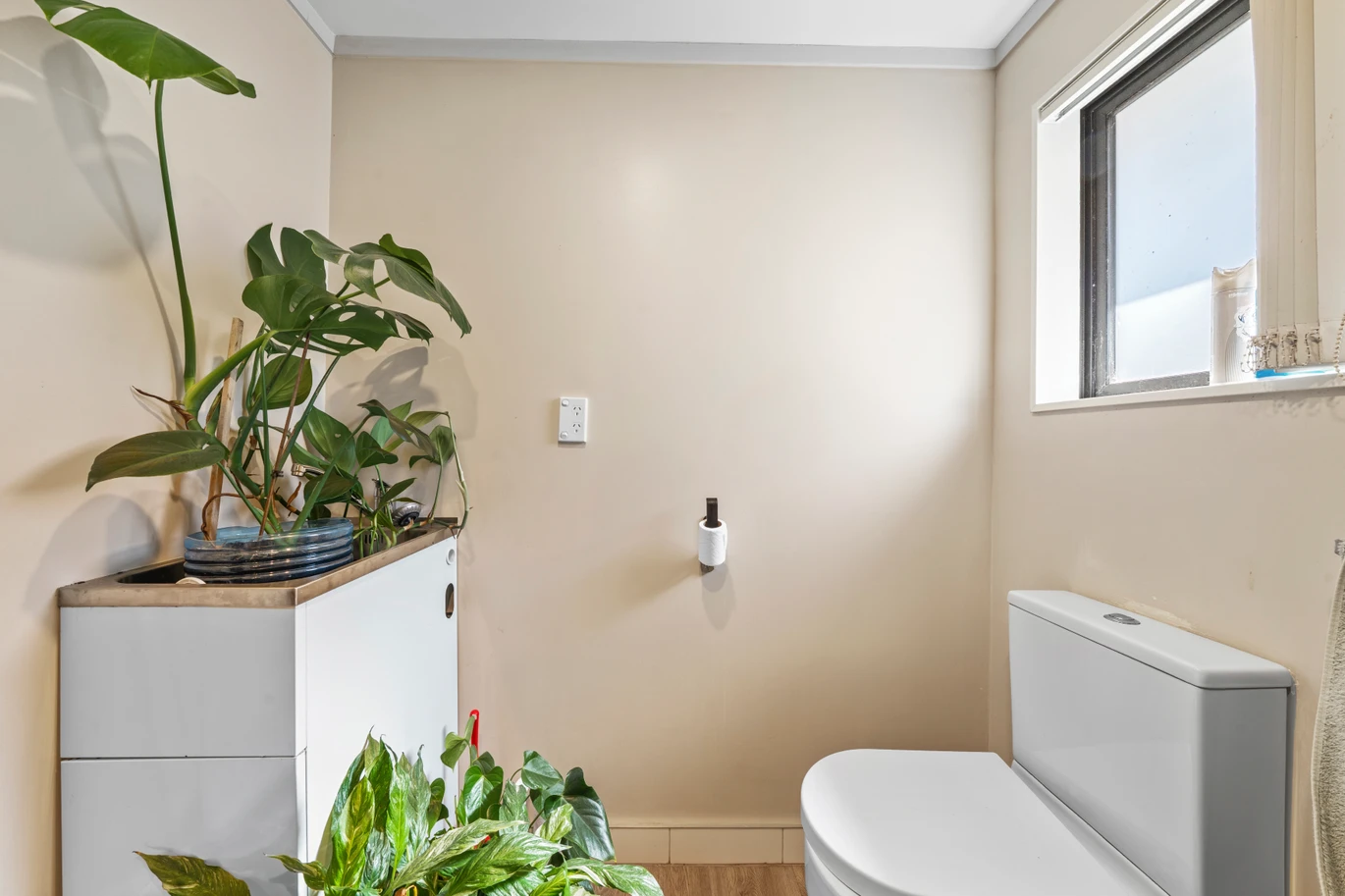 Home and income on 801m2 section, two separate three-bedroom dwellings on one title, each with its own driveway, currently rented for $1,030 per week, close to schools, golf club, shops, 18 Volante Avenue, Wattle Downs, Auckland
