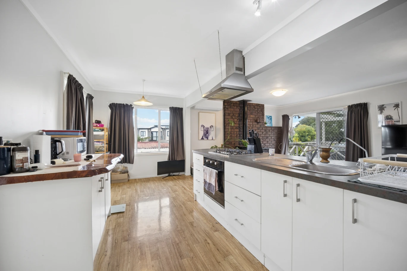 THAB zone, 3 beds 1 bath house with sleepout on 905m2 section, double garage plus a converted rumpus/playroom, Moments from the Te Atatu Peninsula town centre, Kervil Park and coastal walkways, zoned for Matipo Primary School, 13 Gladfield Lane, Te Atatu Peninsula, Auckland