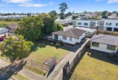 Home and income on 801m2 section, two separate three-bedroom dwellings on one title, each with its own driveway, currently rented for $1,030 per week, close to schools, golf club, shops, 18 Volante Avenue, Wattle Downs, Auckland