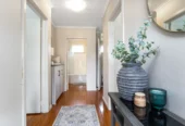 2 bed 1 bath house with garage on 809m2 section, The generous backyard provides plenty of room for kids to play, gardeners to potter, or future plans to unfold, 28 Norman Road, Titirangi, Auckland