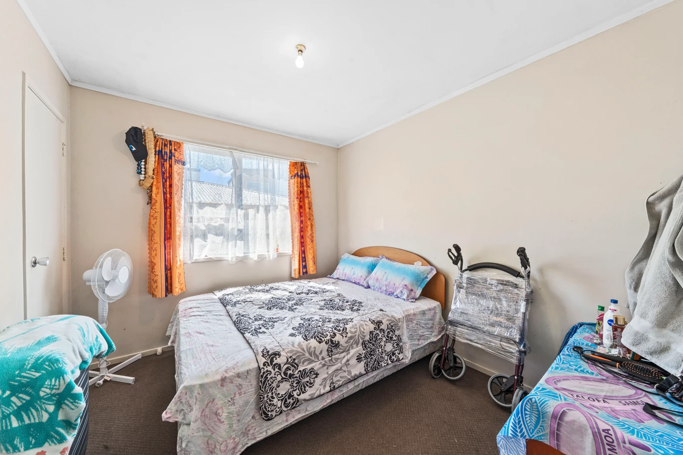 Home and income on 801m2 section, two separate three-bedroom dwellings on one title, each with its own driveway, currently rented for $1,030 per week, close to schools, golf club, shops, 18 Volante Avenue, Wattle Downs, Auckland