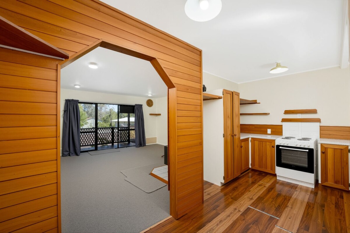 Backing directly onto Tui Glen Reserve, 3 beds 1 bath house with carport, just minutes from WestCity shopping centre, local cafes, schools, easy motorway access, 76B Chilcott Road, Henderson, Auckland