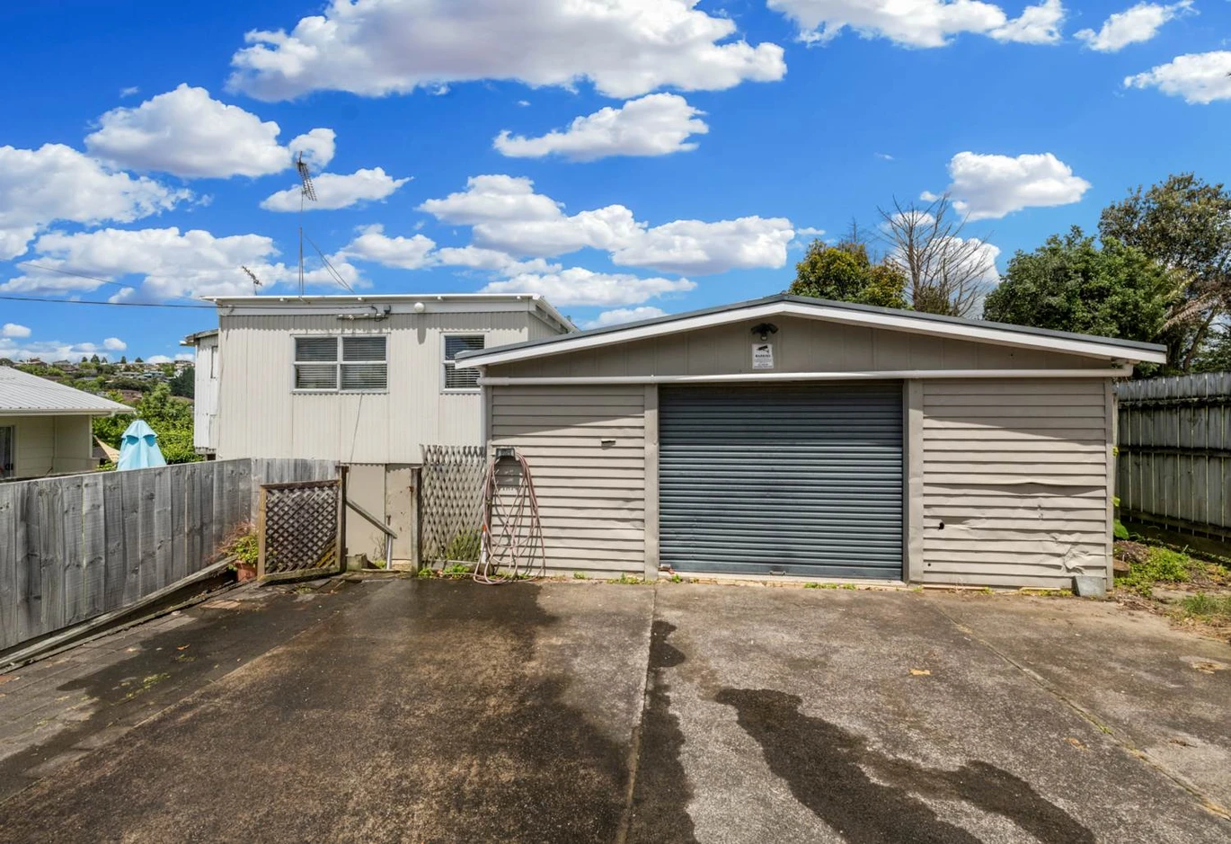 Home and income on 864m2 section, 2 beds 1 bath main house + standalone 1 bed 1 bath second dwelling with garage, both currently rented for $915 per week, Easy walking distance to Stanmore Bay Beach, local schools, shops, cafés, and leisure facilities, welcome all conjunctional sales. 25 Penton Road, Stanmore Bay, Auckland