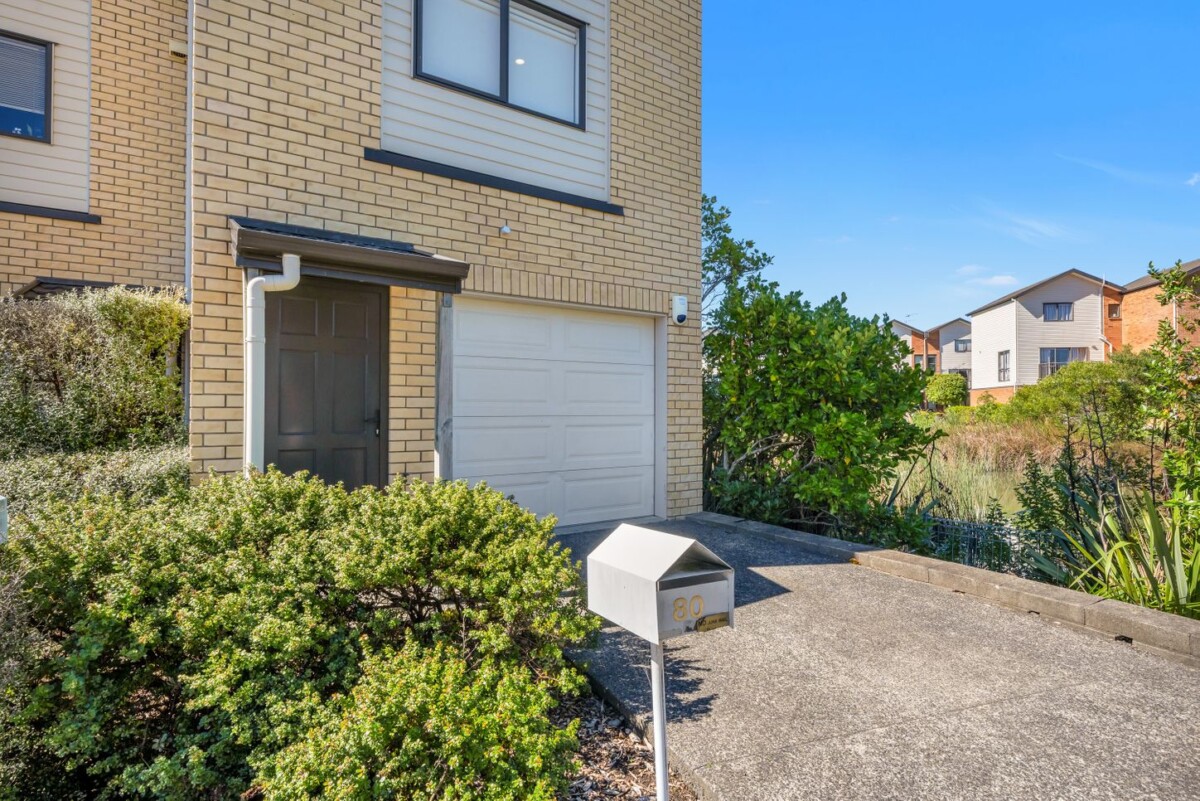 Owners have bought – Must sell, 132m2 2 beds 1 bath home with garage for 2 cars, Enjoy peaceful outlooks with lovely views across the pond, close to local amenities, schools, and transport links, 80/172 McLeod Road, Te Atatu South, Auckland