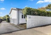 4 beds 1 bath house with garage on 696m2 section, 0.9 km to Western Springs College, 15 Kiwi Road, Pt Chevalier, Auckland